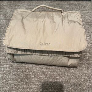 Calpak portable changing pad clutch